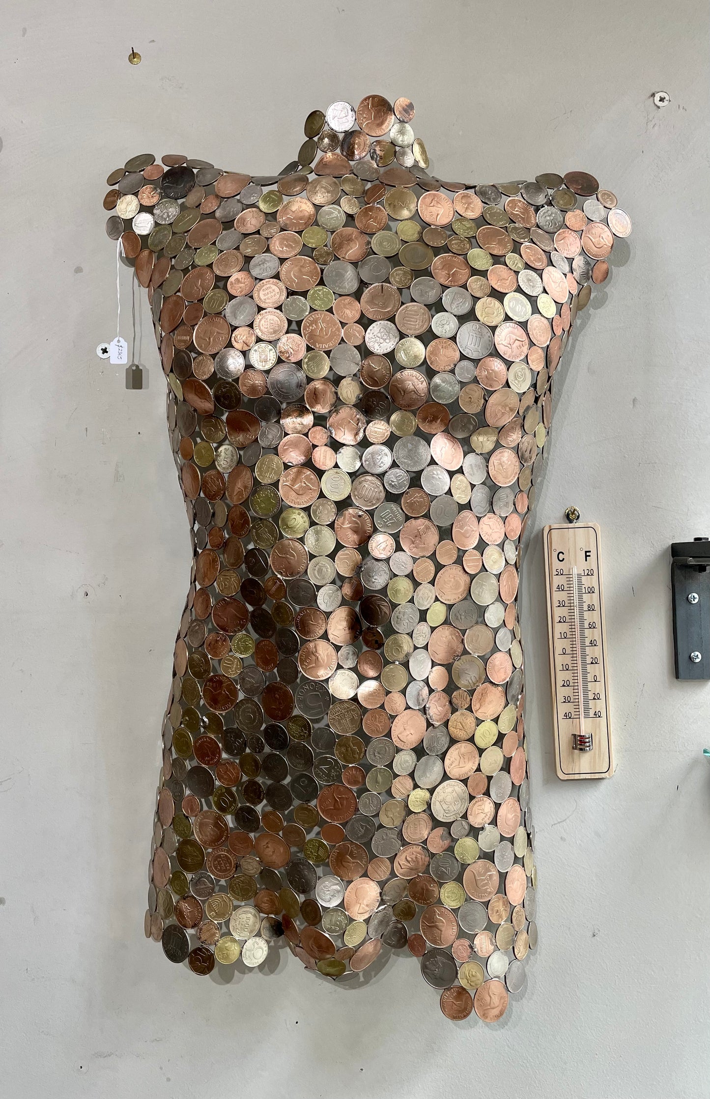 Torsos made of coins